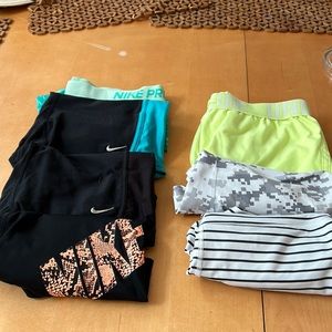 5 pairs of Nike workout shorts. Gently used 1 pair under amour